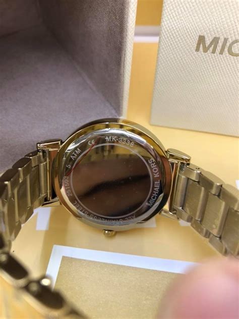 check mk watch serial number|michael kors watch authenticity check.